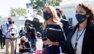 White House Press Secretary Kayleigh McEnany walks to speak to members of the media at the White House in Washington, DC, October 2, 2020. / AFP / SAUL LOEB
