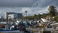 Fishermen from the coastal area of Cancun save their boats in preparation for the arrival of Hurrican Delta, in the state of Quintana Roo, Mexico on October 6, 2020. Hurricane Delta intensified into a Category 3 storm on Tuesday and is set to slam into Me