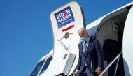 U.S. Democratic presidential candidate Joe Biden steps from his plane en route to a campaign event in Pennsylvania at Hagerstown Regional Airport in Hagerstown, Maryland, U.S., October 6, 2020. REUTERS/Kevin Lamarque
