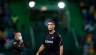 Portugal's forward Cristiano Ronaldo warms up before the friendly football match between Portugal and Spain at the Jose Alvalade stadium in Lisbon on October 7, 2020. / AFP / CARLOS COSTA
