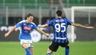 July 28, 2020 Napoli's Piotr Zielinski in action with Inter Milan's Alessandro Bastoni, as play resumes behind closed doors following the outbreak of the coronavirus disease (COVID-19) REUTERS/Daniele Mascolo/File Photo