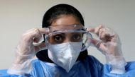 File photo: A nurse wearing a protective face mask and gloves looks on at Hazrate Ali Asghar Hospital, amid the outbreak of the coronavirus disease (COVID-19), in Tehran, Iran September 27, 2020. Majid Asgaripour/WANA (West Asia News Agency) via Reuters 