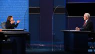 TOPSHOT - US Democratic vice presidential nominee and Senator from California, Kamala Harris (L) gestures toward US Vice President Mike Pence Mike Pence as she speaks during the vice presidential debate in Kingsbury Hall at the University of Utah on Octob