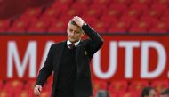 Manchester United's Norwegian manager Ole Gunnar Solskjaer walks off the pitch at the end of the game during the English Premier League football match between Manchester United and Tottenham Hotspur at Old Trafford in Manchester, north west England, on Oc