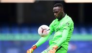 Chelsea's French goalkeeper Edouard Mendy stops a shot during the English Premier League football match between Chelsea and Crystal Palace at Stamford Bridge in London on October 3, 2020. AFP / NEIL HALL /