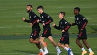 Bayern Munich's new Cameroon forward Eric Maxim Choupo-Moting, Bayern Munich's Spanish midfielder Marc Roca, Bayern Munich's Portuguese midfielder Tiago Dantas and Bayern Munich's French defender Bouna Sarr run during an individual trainings session at th