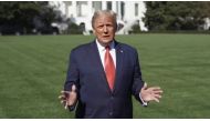 US President Donald Trump speaks outside the White House, where he is being treated for the coronavirus disease (COVID-19), in Washington, U.S. in this still image taken from social media video released on October 8, 2020. @realDonaldTrump/via REUTERS 
