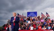 (FILES) In this file photo taken on September 8, 2020 US President Donald Trump arrives for a campaign rally at Smith-Reynolds Regional Airport in Winston-Salem, North Carolina. / AFP / MANDEL NGAN
