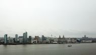 An aerial picture shows a ferry crossing the River Mersey in Liverpool on October 12, 2020, as the government is expected to announce further lockdown restrictions today as COVID-19 infection rates rocket across the northwest of England. / AFP / Paul ELLI