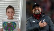 Reuters file picture of Jurgen Klopp and Lewis Balfe Picture from Twitter / balfe_mils
