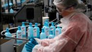 FILE PHOTO: An employee works on the production of hydroalcoholic gel at the Christeyns company's factory in Vertou near Nantes, France, March 6, 2020. REUTERS/Stephane Mahe/File Photo
