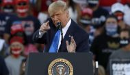 President Donald Trump gestures during a campaign rally on October 18, 2020, in Carson City, Nevada. Stephen Lam/Getty Images/AFP