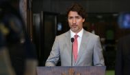 (FILES) In this file photo taken on August 18, 2020 Canada's Prime Minister Justin Trudeau speaks during a news conference on Parliament Hill in Ottawa, Canada. Canadian Prime Minister Justin Trudeau on October 20, 2020 warned that an opposition push for 
