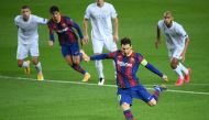 Barcelona's Argentine forward Lionel Messi scores a penalty during the UEFA Champions League football match between FC Barcelona and Ferencvarosi TC at the Camp Nou stadium in Barcelona on October 20, 2020. / AFP / LLUIS GENE