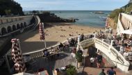 People have lunch on a terrace in Biarritz, southwestern France on October 21, 2020. France will place more regions on the highest health alert level as coronavirus infections continue to spread fast, the government's spokesman said on October 21, 2020. /
