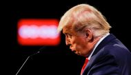 TOPSHOT - US President Donald Trump reacts during the final presidential debate at Belmont University in Nashville, Tennessee, on October 22, 2020. / AFP / POOL / JIM BOURG
