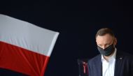 (FILES) In this file photo taken on June 28, 2020, Polish President Andrzej Duda arrives at a polling station to take part in a voting during Poland's Presidental election in Krakow, Poland. Poland's President Andrzej Duda has tested positive for coronavi