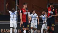 Inter Milan's Belgian forward Romelu Lukaku (R) celebrates after scoring his team's first goal during the Italian Serie A football match Genoa vs Inter Milan at the Luigi-Ferraris Stadium in Genoa, on October 24, 2020. / AFP / MARCO BERTORELLO