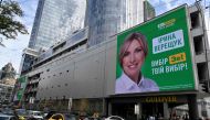A huge screen displays an election campaign ad of mayoral candidate from president Volodymyr Zelensky's ruling Servant of the People party Iryna Vereshchuk in the center of the Ukrainian capital of Kiev on October 23, 2020, ahead of October 25 local elect