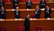 Chinese President Xi Jinping is applauded as he arrives for a ceremony marking the 70th anniversary of China's entry into the Korean War, in Beijing's Great Hall of the People on October 23, 2020. / AFP / NOEL CELIS