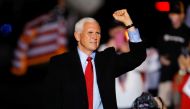 U.S. Vice President Mike Pence makes a fist at the end of a rally in Kinston, North Carolina, U.S., October 25, 2020. REUTERS/Jonathan Drake