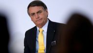 FILE PHOTO: Brazil's President Jair BOLSONARO looks on during the COVID-19 Clinical Study Result Announcement Ceremony at the Planalto Palace in Brasilia, Brazil, October 19, 2020. REUTERS/Adriano Machado/File Photo
