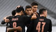 Manchester City's German midfielder Ilkay Gundogan celebrates with team mates after scoring a goal during the UEFA Champions League Group C football match between Olympique de Marseille and Manchester City on October 27, 2020 at the Velodrome Stadium in M