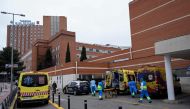 Ambulances are parked at the 12 de Octubre hospital in Madrid, amid the coronavirus (COVID-19) pandemic, on October 28, 2020. / AFP / OSCAR DEL POZO
