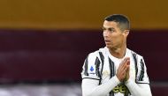 (FILES) In this file photo taken on September 27, 2020 Juventus' Portuguese forward Cristiano Ronaldo reacts during the Italian Serie A football match Roma vs Juventus at the Olympic stadium in Rome. Portuguese star Cristiano Ronaldo has been left off Juv