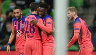 Chelsea's English midfielder Callum Hudson-Odoi celebrates with teammates after scoring the opening goal during the UEFA Champions League football match between Krasnodar and Chelsea at the Krasnodar stadium in Krasnodar on October 28, 2020. / AFP / Kiril