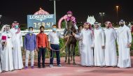 Qatar Cup winners pose for a group picture. 