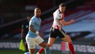 Manchester City's Kyle Walker in action with Sheffield United's John Lundstram Pool via REUTERS/Catherine Ivill 