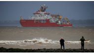 People watch as the RSS Sir David Attenborough leaves Liverpool to begin sea trials in New Brighton, Britain, November 3, 2020. REUTERS/Phil Noble