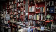 This photograph taken on November 2, 2020, shows books displayed at the Librairie des Abbesses bookstore in the Montmartre district in Paris on November 2, 2020, during the launch of 