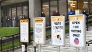 Voters wait in line to cast their ballots at the Los Angeles County Registar in Norwalk, California on November 3, 2020 where people are voting in the 2020 US elections. Americans were voting on Tuesday under the shadow of a surging coronavirus pandemic t