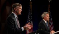 Republican U.S. Sen. Cory Gardner participates with Democratic challenger and former Colorado Gov. John Hickenlooper in the final debate in the 2020 race for Colorado's U.S. Senate seat at Colorado State University in Fort Collins, Colorado, U.S. October 