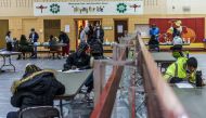 Residents vote at a polling place in Minneapolis, Minnesota on November 3, 2020.  / AFP / Kerem Yucel