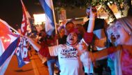 Supporters of U.S. President Donald Trump cheer outside of the Versailles restaurant as they await the results of the presidential election on November 03, 2020 in Miami, Florida. Joe Raedle/Getty Images/AFP