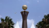 A plane flies next to Tigray Martyrs' monument during the funeral ceremony of Ethiopia's Army Chief of Staff Seare Mekonnen in Mekele, Tigray Region, Ethiopia June 26, 2019. Picture taken June 26, 2019. REUTERS/Tiksa Negeri