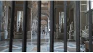 FILE PHOTO: An empty corridor inside Vatican Museums is seen through bars as staff prepare for reopening on June 1 with new social distancing and hygiene rules in this still image taken from an undated video in Vatican City. Musei Vaticani/Handout via Reu