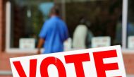 Signs direct voters into a polling station during the 2020 U.S. presidential election in Durham, Durham County, North Carolina, U.S., November 3, 2020. REUTERS/Jonathan Drake
