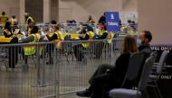 poll watchers observe as votes are counted at the Pennsylvania Convention Center on Election Day in Philadelphia, Pennsylvania, U.S. November 3, 2020. REUTERS/Rachel Wisniewski
