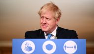 Britain's Prime Minister Boris Johnson delivers a statement on the current coronavirus statistics and testing and lockdown measures during a virtual press conference inside 10 Downing Street in central London on November 5, 2020, as new lockdown restricti