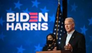 Democratic Presidential candidate Joe Biden speaks as US Senator and Vice-Presidential candidate, Kamala Harris, looks on at the Queen venue in Wilmington, Delaware, on November 5, 2020. The nail-biting US election was on the cusp of finally producing a w