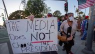 Supporters of US President Donald Trump rally after Democratic nominee Joe Biden won the 2020 presidential election, in Beverly Hills, California, on November 7, 2020. AFP / DAVID MCNEW