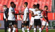Brest's players and Lille's players congratulate at the end of the French L1 football match between Brest and Lille at the Francis Le Ble Stadium in Brest on November 8, 2020. / AFP / Fred TANNEAU