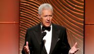 FILE PHOTO: Jeopardy television game show host Alex Trebek speaks on stage during the 40th annual Daytime Emmy Awards in Beverly Hills, California June 16, 2013. REUTERS/Danny Moloshok/File Photo
