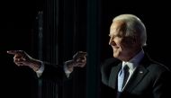 FILE PHOTO: President-elect Joe Biden points a finger at his election rally in Wilmington, Delaware, November 7. REUTERS/Kevin Lamarque