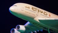 A model Etihad Airways plane is seen on stage in New York, U.S. November 13, 2014. REUTERS/Lucas Jackson/File Photo