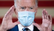 In this file photo former Democratic presidential candidate Joe Biden speaks during a campaign event in Fort Lauderdale, Florida on October 13, 2020. US President-elect Joe Biden on November 9, 2020 named the scientists who will lead his administration's 